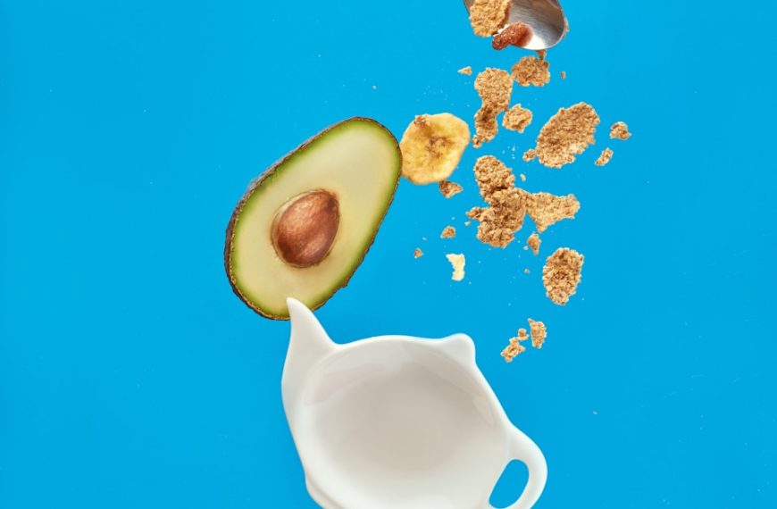 white ceramic mug with silver spoon