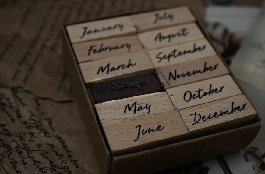 a close up of a wooden block with writing on it
