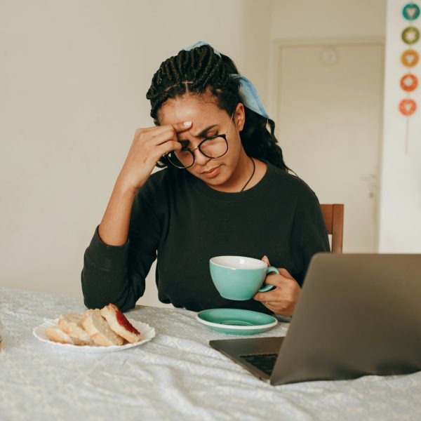 woman in black long sleeve shirt sitting on chair
