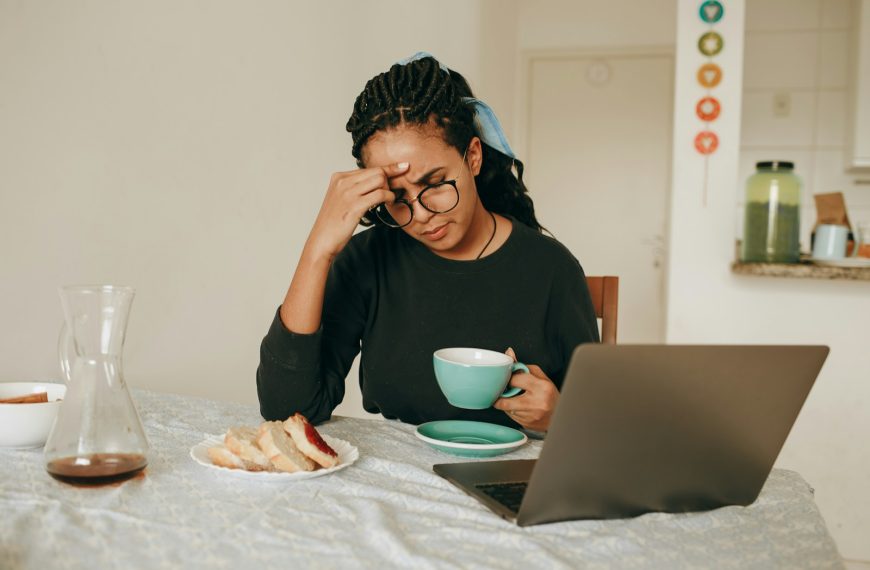 woman in black long sleeve shirt sitting on chair