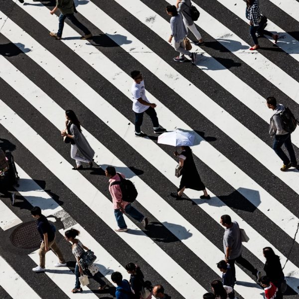 peoples walking on pedestrian lane
